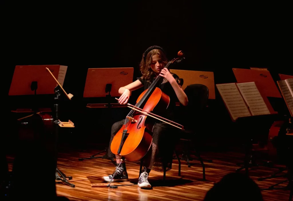 woman in orchestra playing upright bass- how to eq upright bass