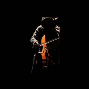 A hoodie-clad man expertly playing a cello in the dark, creating a mysterious and captivating fusion of hip hop and orchestra.