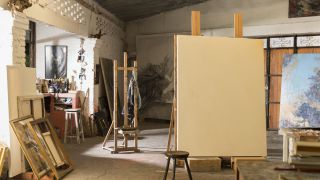 Starting Point: An artist's studio showcasing easels and a variety of paintings.