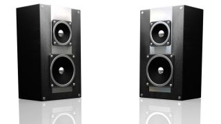 Two speakers with the Stereo Toolkit on a white background.