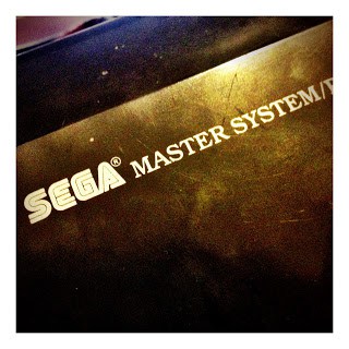 The Sega Master System logo is displayed on a black box.