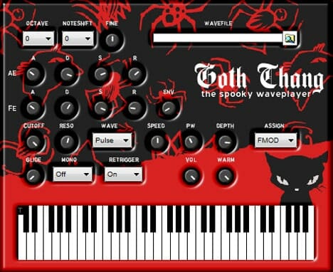 A goth keyboard with a cat on it.