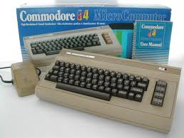 A Commodore 64 computer with a keyboard.