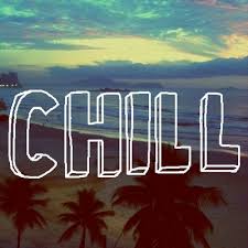 The word chill is written on a beach with palm trees in the background.