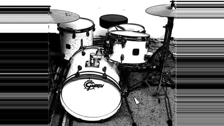A black and white photo of a Gretsch drum set.