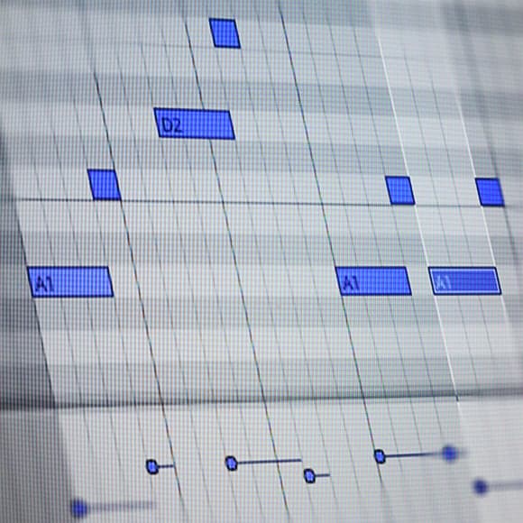 A computer screen showing a music sheet with blue squares used by Electronic Music Producers.