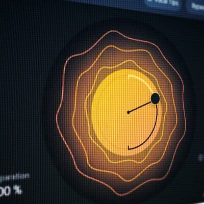 A computer screen with an orange circle on it, featuring iZotope software.
